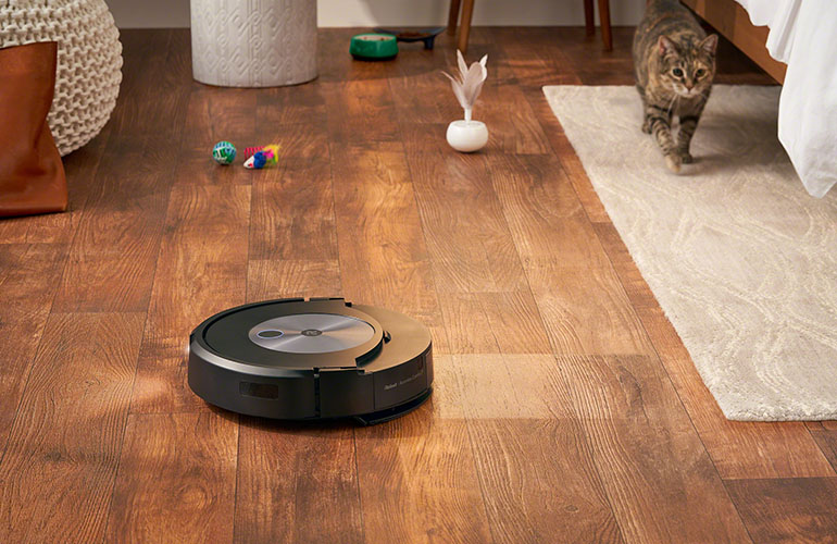 a roomba on hardwood floors. 