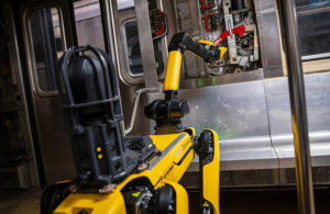 boston dynamics spot robot inspects a cabinet.